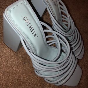Cute blue strappy heeled sandals.